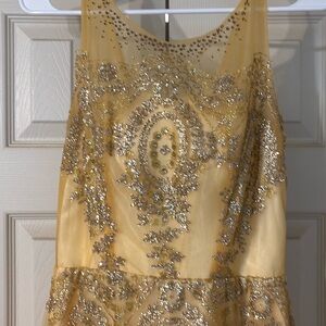 Elegant Golden Yellow Gown with Gold and Silver Embellishments